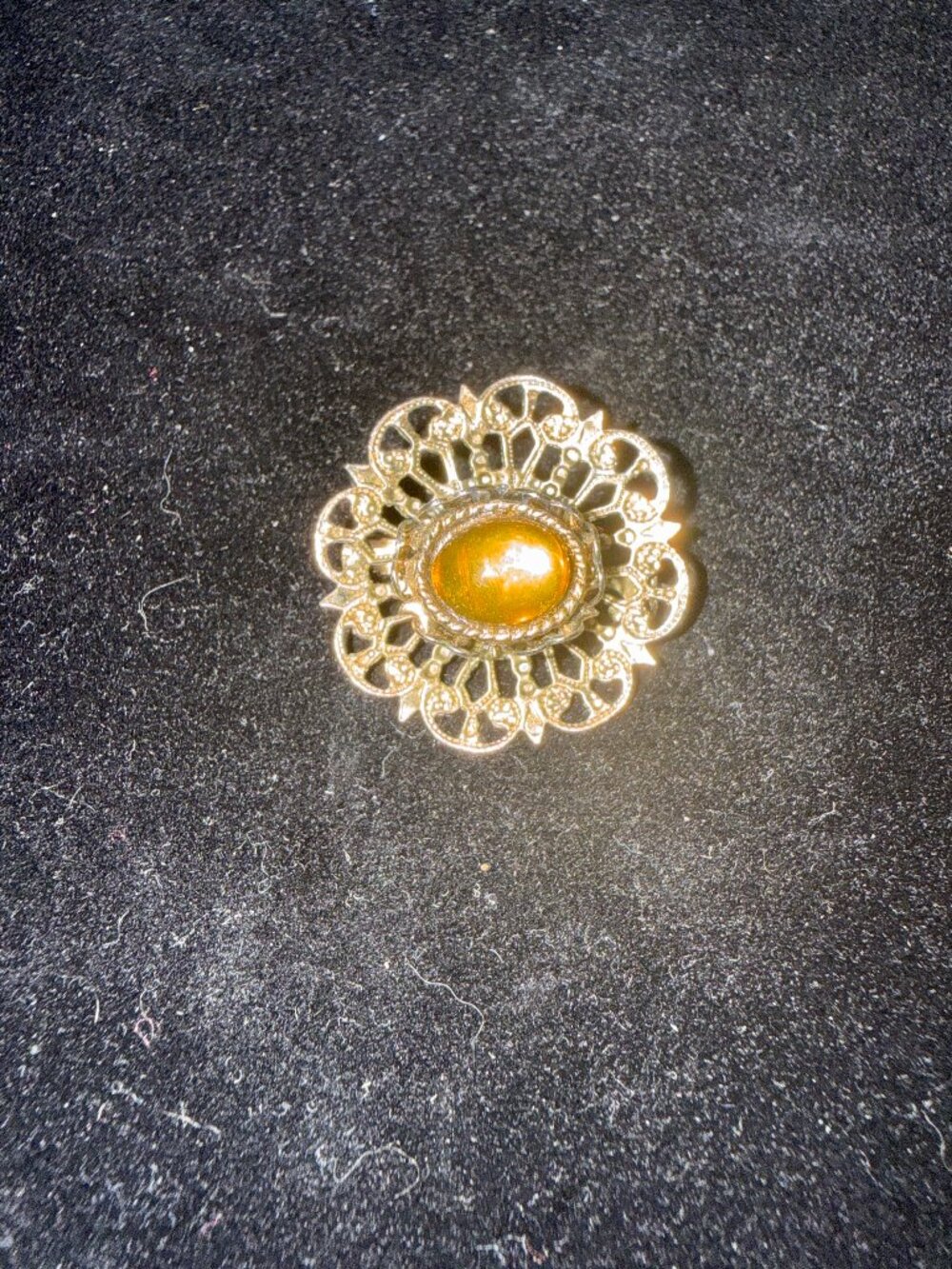 vintage filligree brooch with amber glass cobochan stone